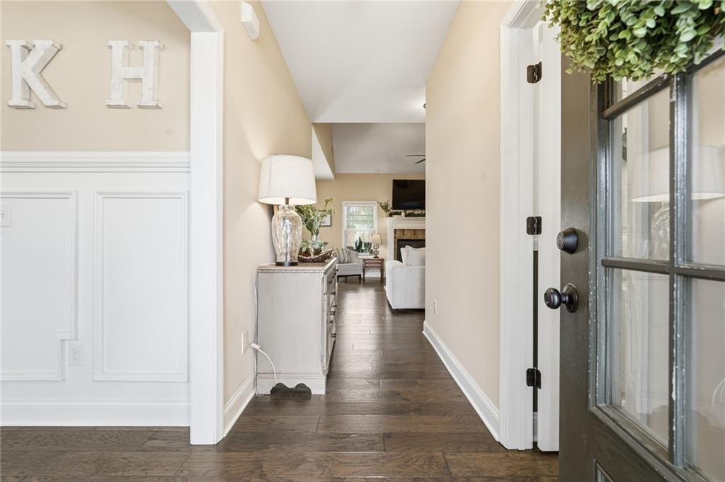 266 Cobblestone Trail Dallas, GA 30132 - Photo 20 of 49 a view of a hallway with white walls and stairs