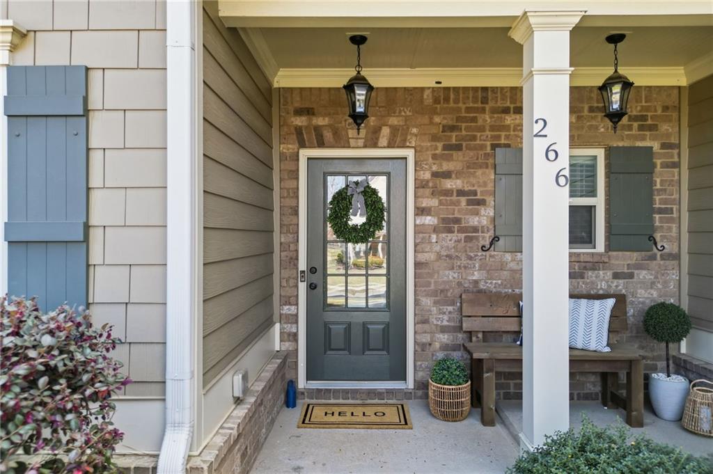 266 Cobblestone Trail Dallas, GA 30132 - Photo 2 of 49 a front view of a house with a porch
