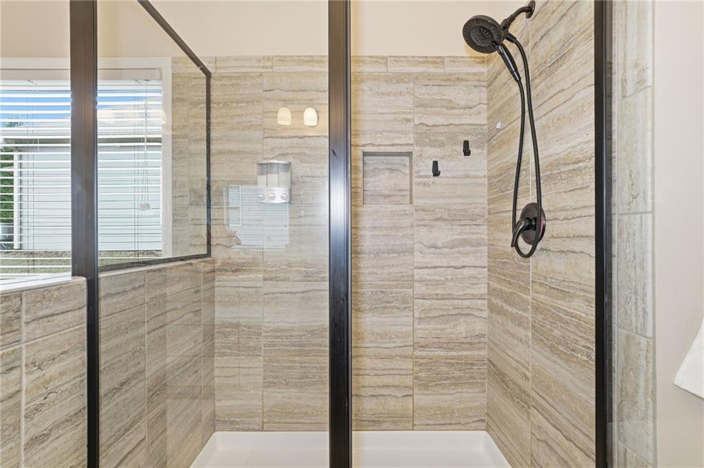 266 Cobblestone Trail Dallas, GA 30132 - Photo 26 of 49 a bathroom with a shower