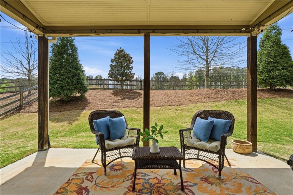 266 Cobblestone Trail Dallas, GA 30132 - Photo 44 of 49 a view of a chairs and table in the patio