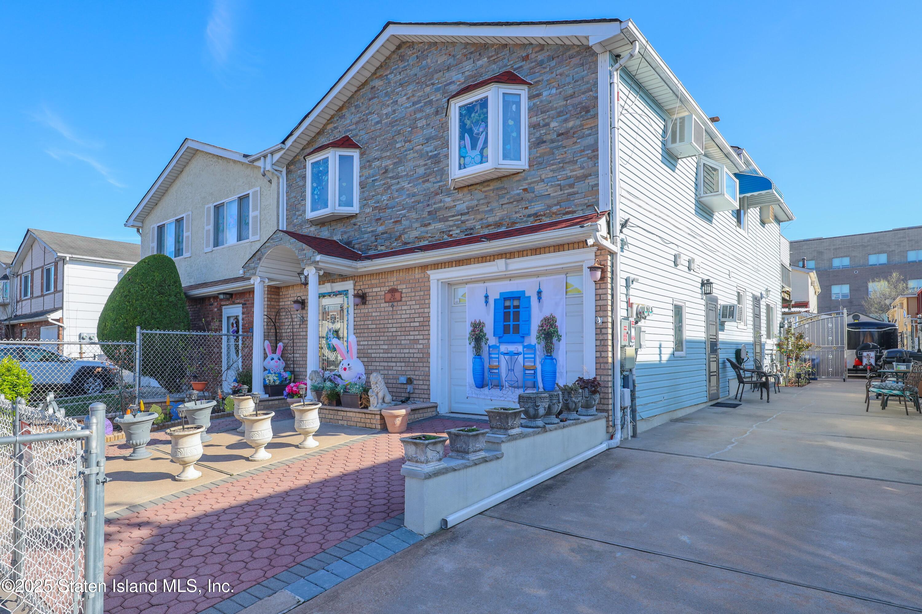 268 Ada Drive Staten Island, NY 10314 - Photo 2 of 27 a view of a building with sitting area