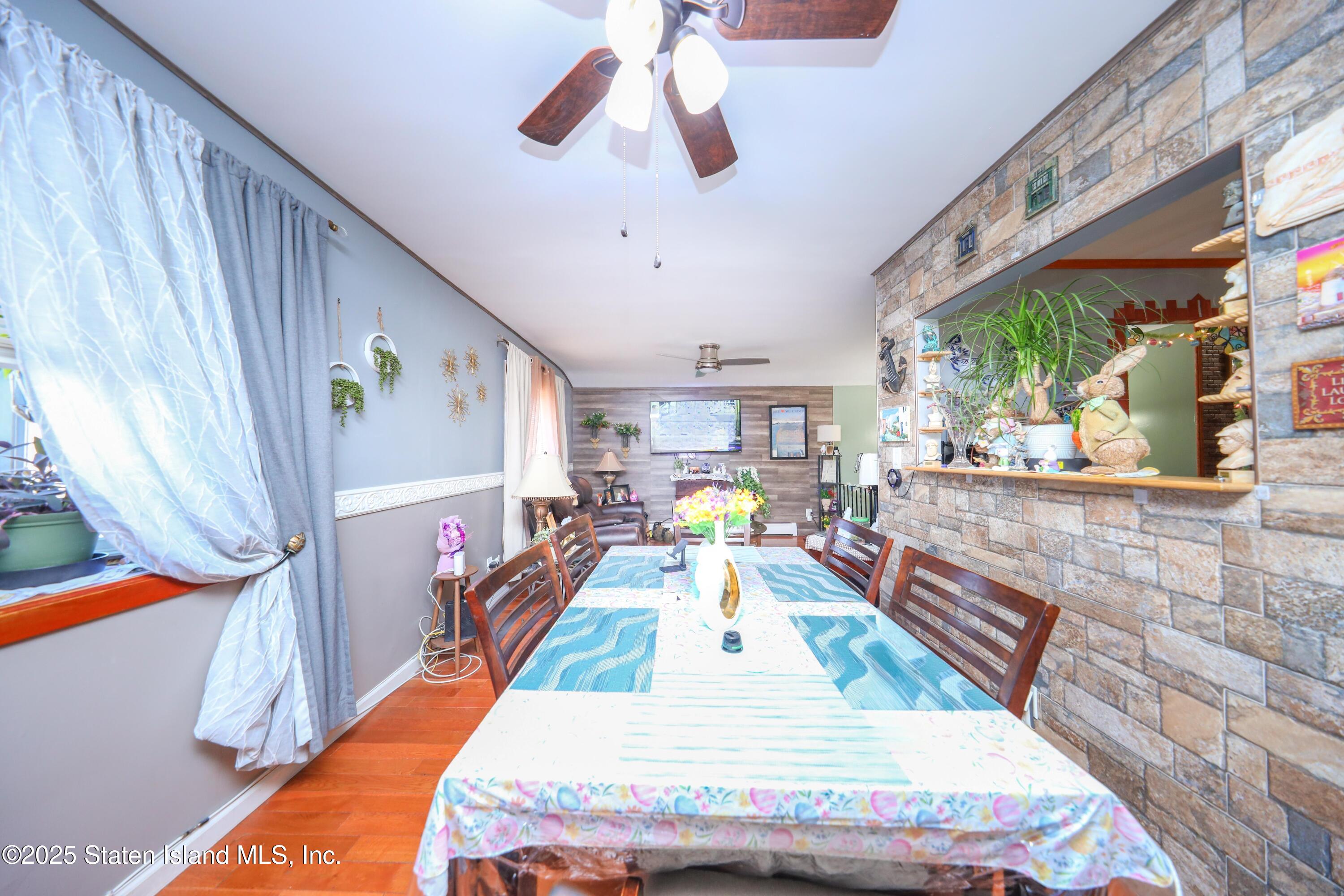 268 Ada Drive Staten Island, NY 10314 - Photo 5 of 27 a bed room with a bed and a rug