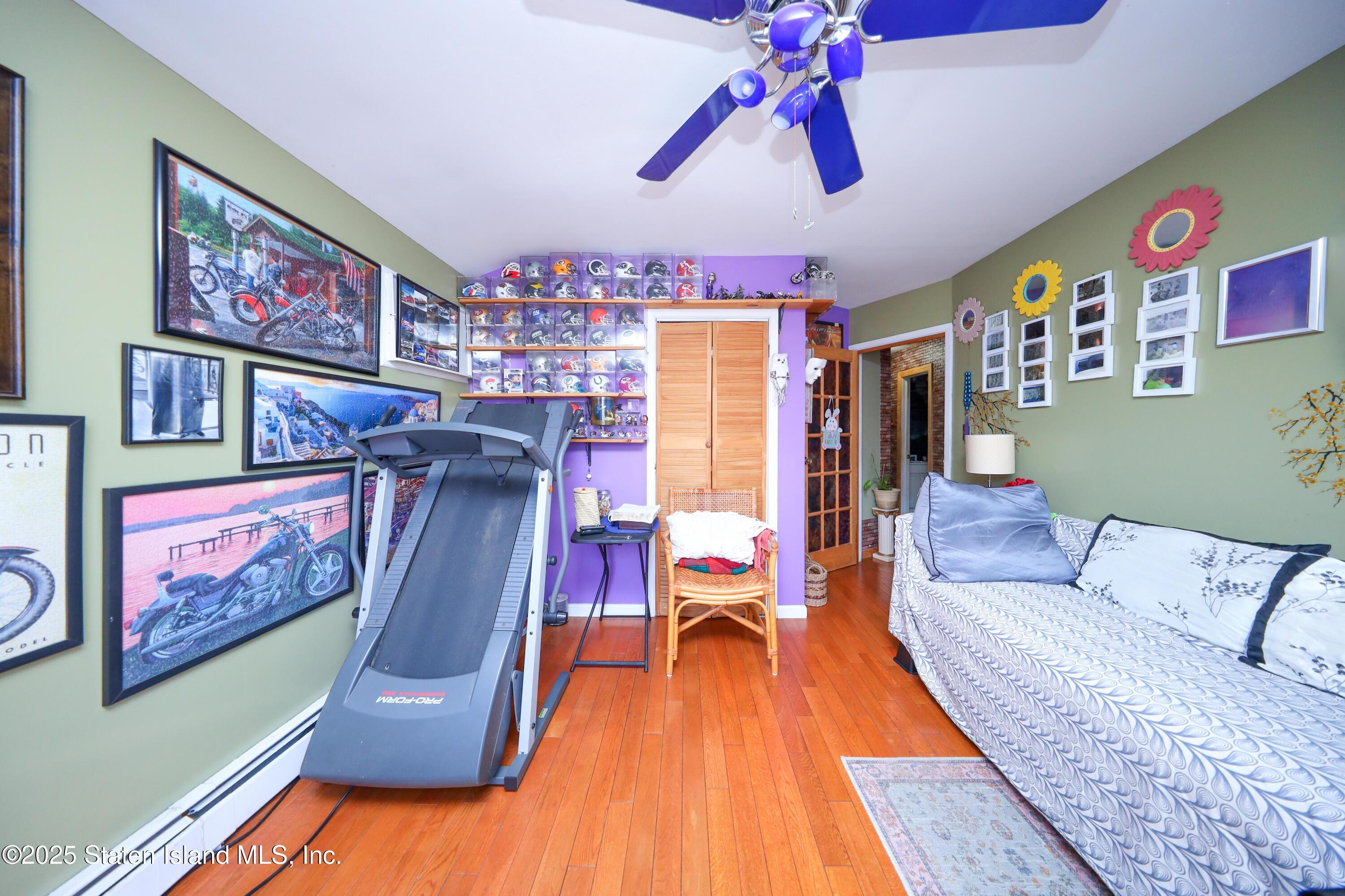 268 Ada Drive Staten Island, NY 10314 - Photo 9 of 27 a living room with furniture and a wooden floor