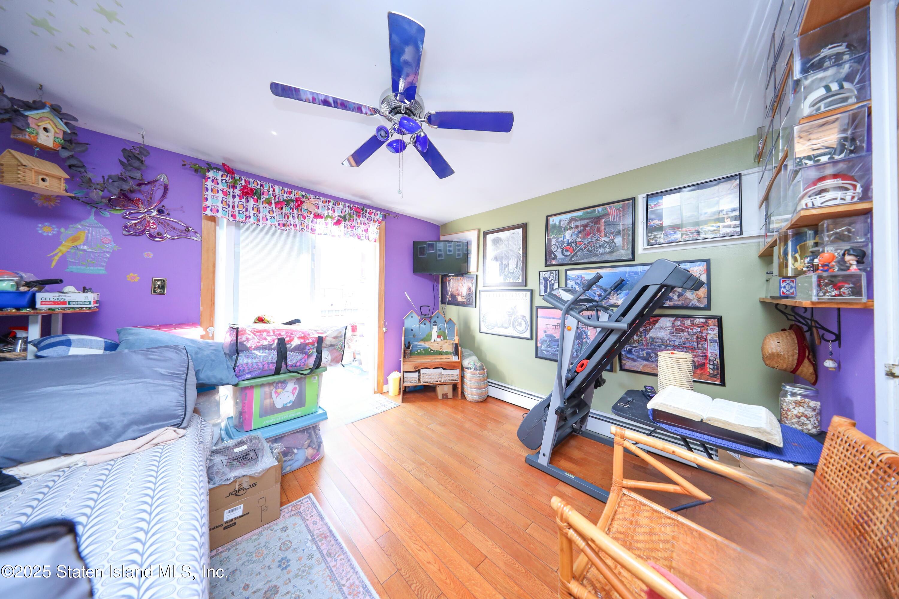 268 Ada Drive Staten Island, NY 10314 - Photo 10 of 27 a view of a room with gym equipment