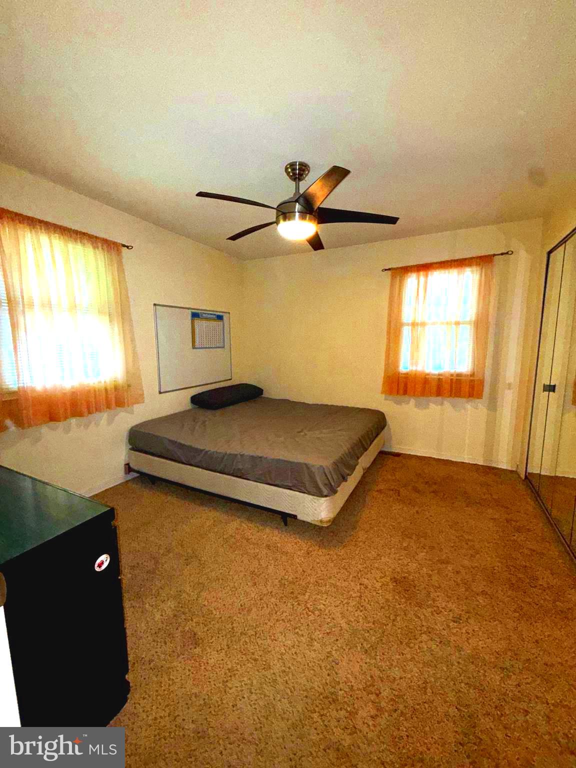 2666 Madara Road Bensalem, PA 19020 - Photo 11 of 16 a view of a livingroom with a ceiling fan and window