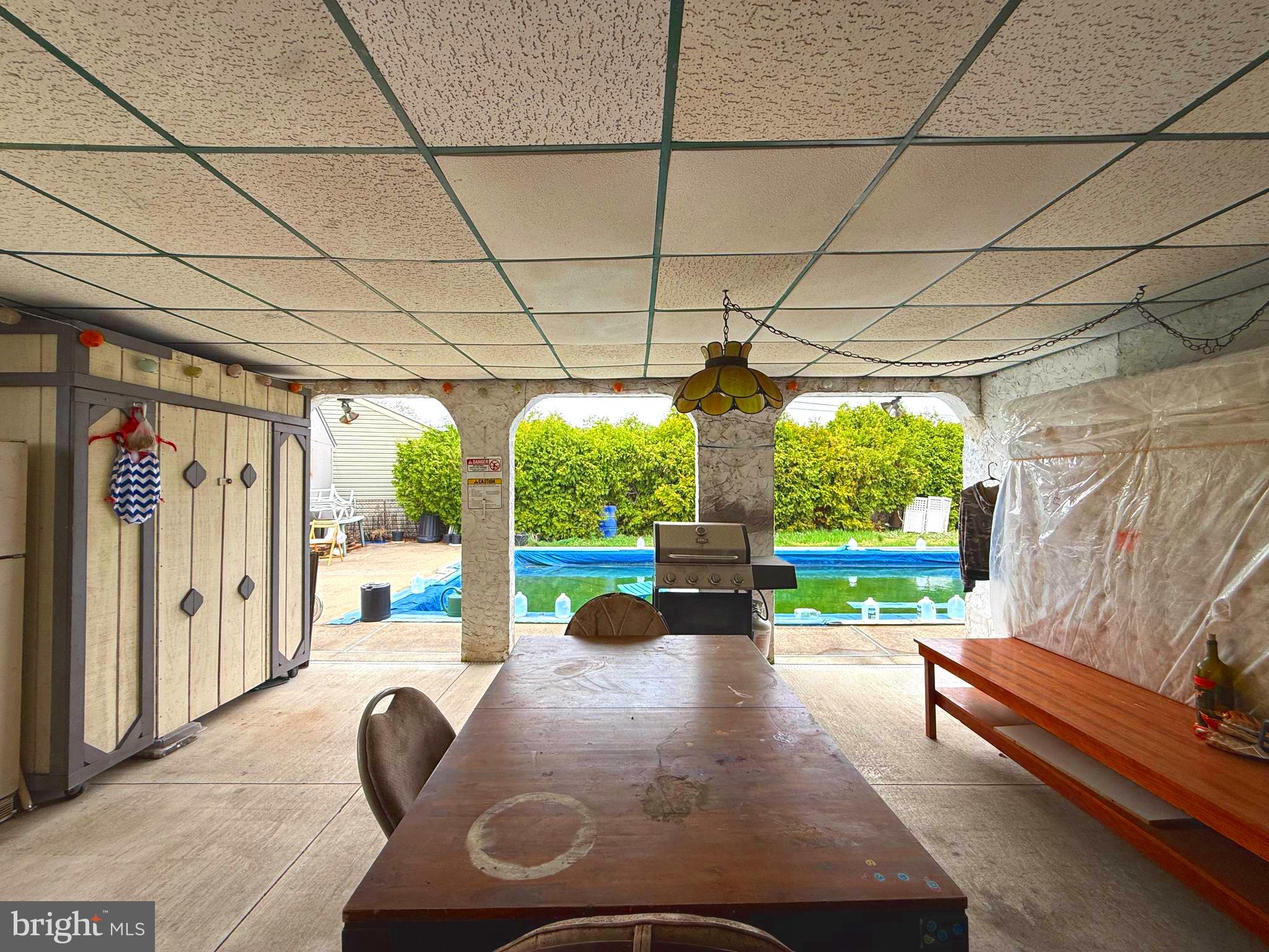 2666 Madara Road Bensalem, PA 19020 - Photo 14 of 16 a patio with patio of water fountain and a fire pit