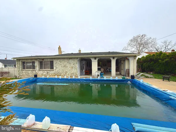 a view of outdoor space yard swimming pool and patio