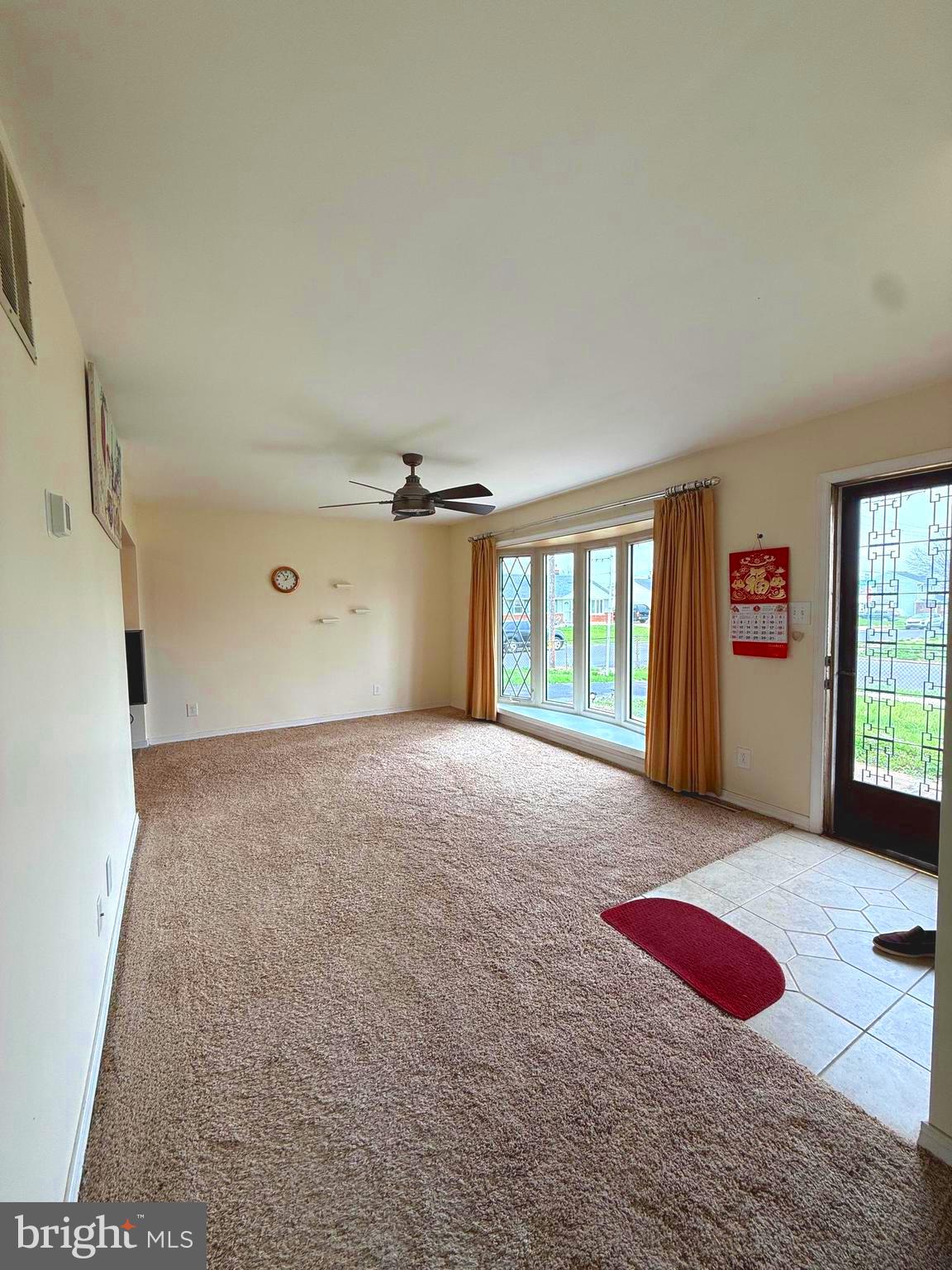 2666 Madara Road Bensalem, PA 19020 - Photo 5 of 16 a bedroom with a bed and a window