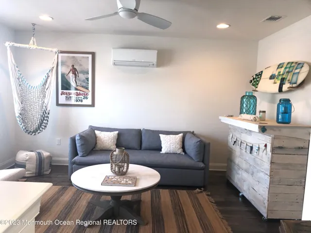 a living room with furniture and a table