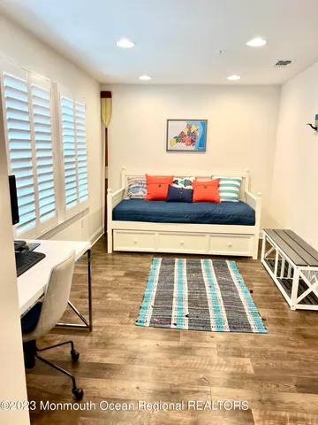 a living room with a rug