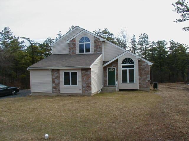 5729 Clover Road Long Pond, PA 18334 - Photo 1 of 1 a view of a house with a yard