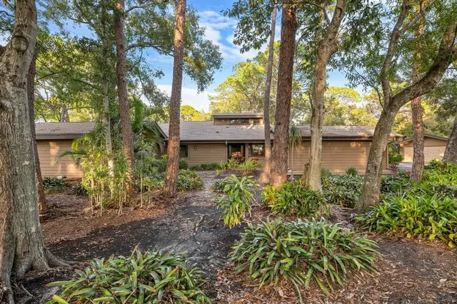 front view of a house with a garden