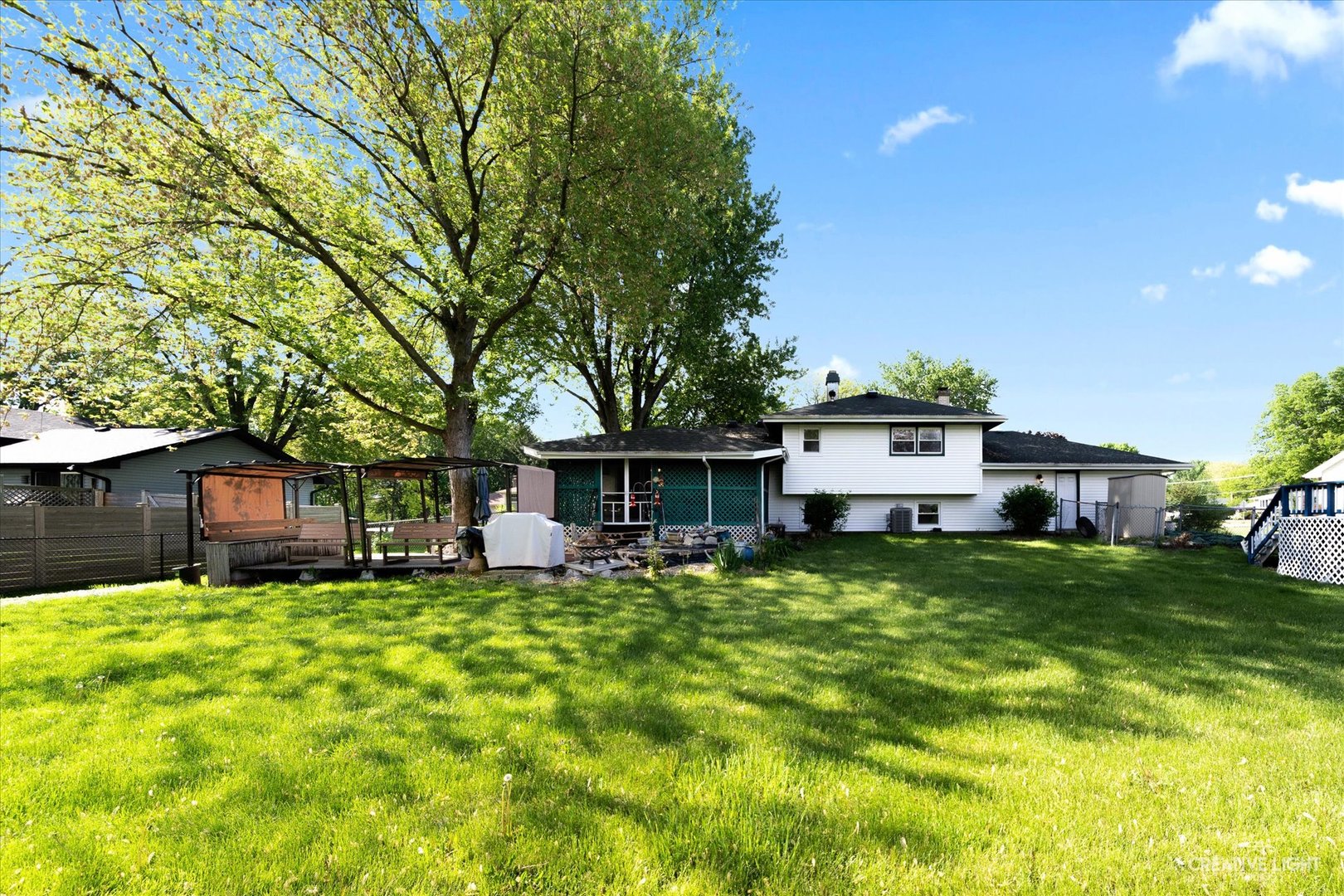 28W758 Wagner Road Naperville, IL 60564 - Photo 16 of 22 a house view with a sitting space and garden