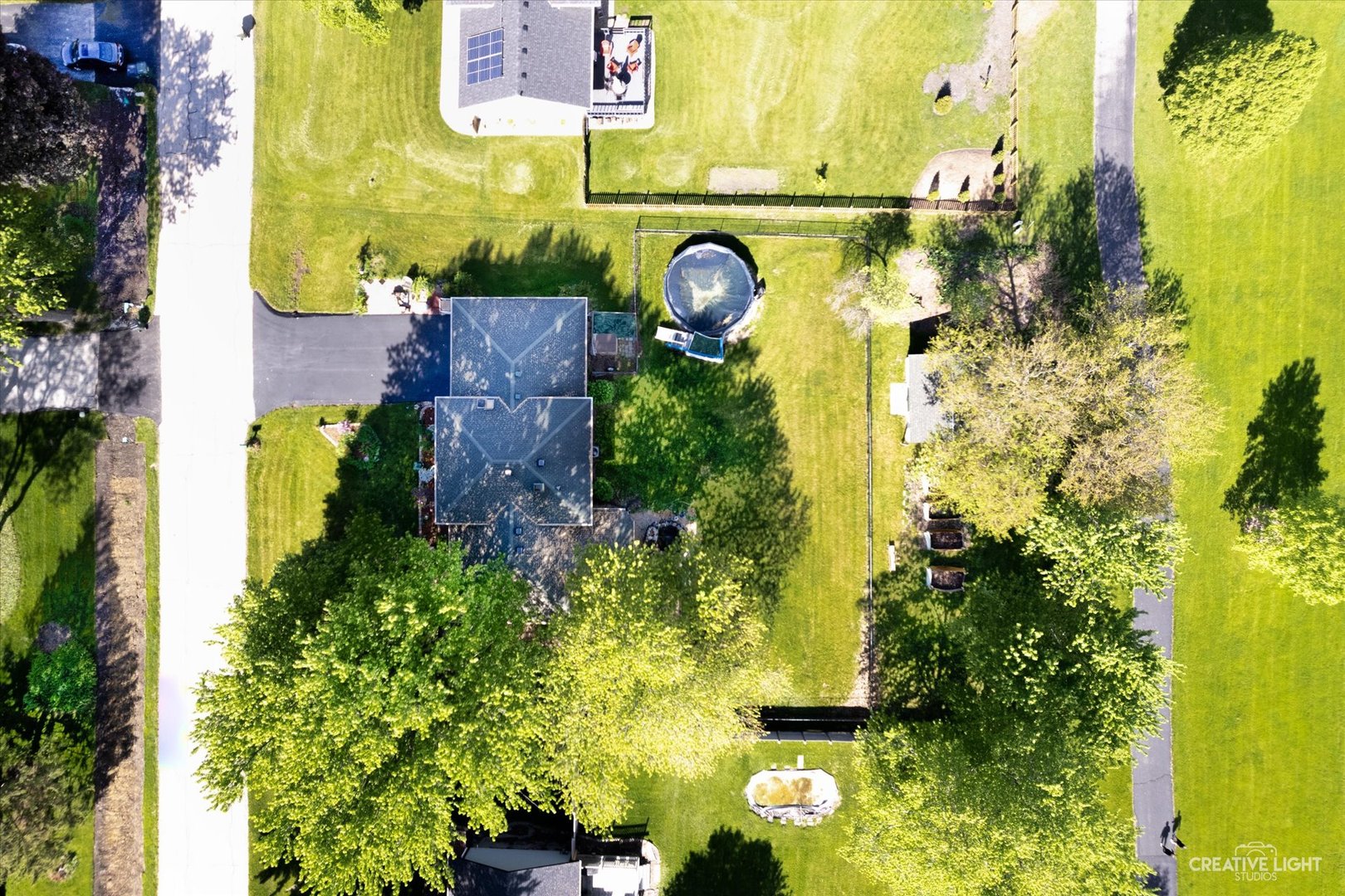 28W758 Wagner Road Naperville, IL 60564 - Photo 21 of 22 an aerial view of residential house with outdoor space and swimming pool