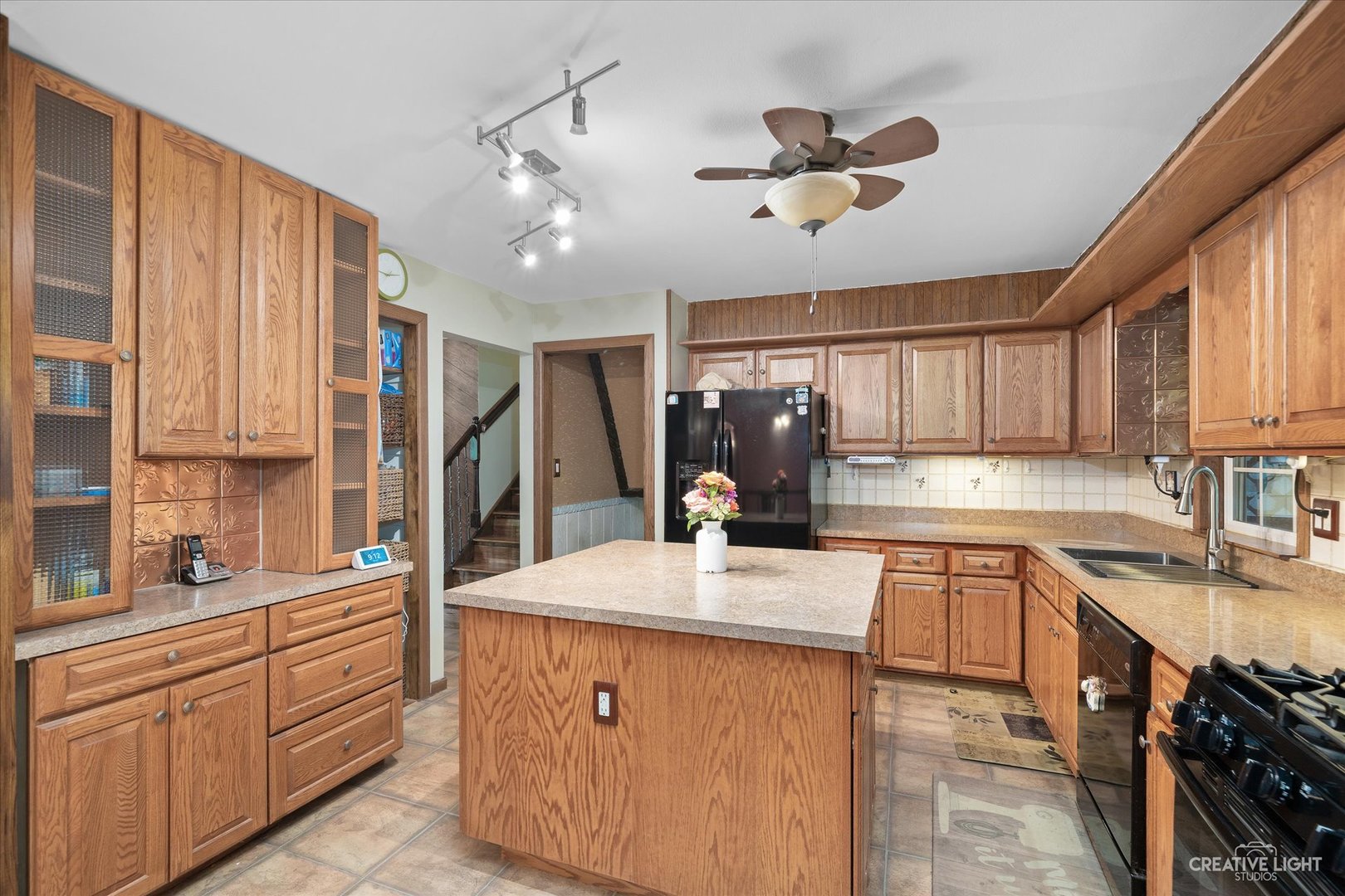 28W758 Wagner Road Naperville, IL 60564 - Photo 4 of 22 a kitchen with stainless steel appliances a sink stove and cabinets