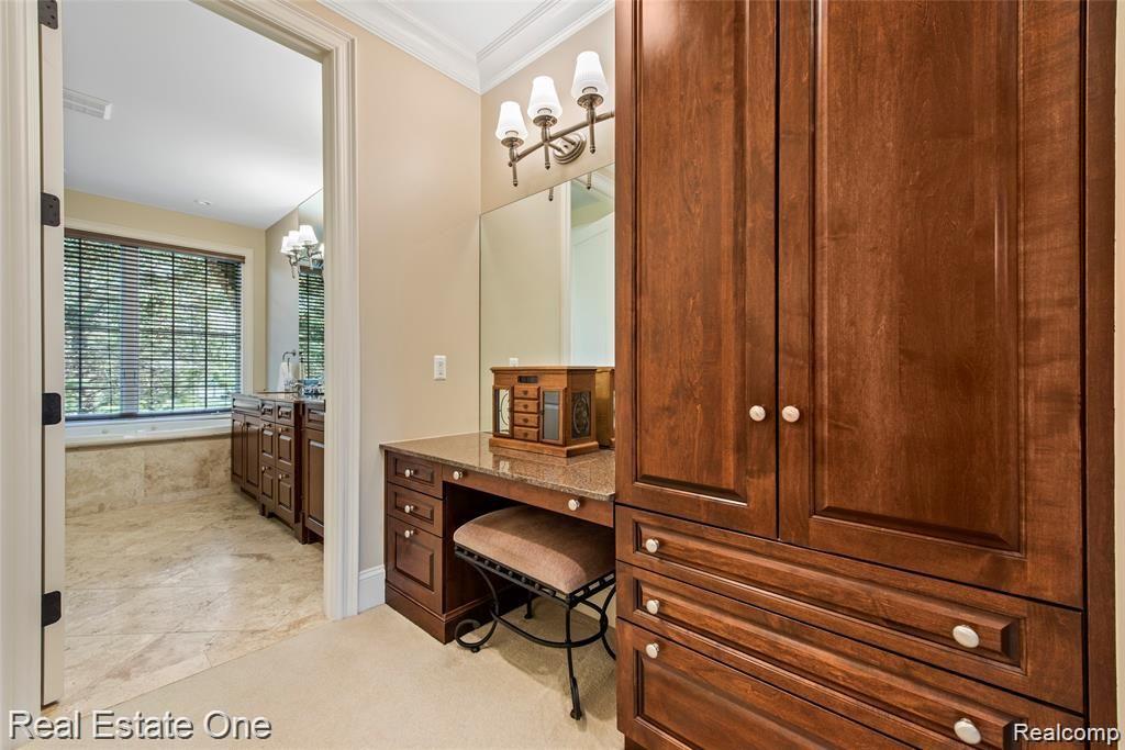 7500 Maple Ridge Drive Clarkston, MI 48346 - Photo 21 of 75 Separate makeup vanity area with cabinetry