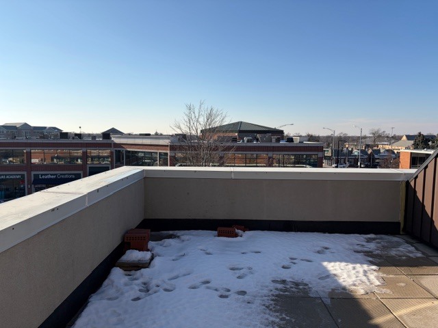 625 Deerfield Road, Unit 419 Deerfield, IL 60015 - Photo 10 of 19 a view of a terrace with a bench