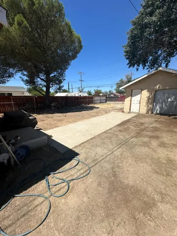 a street view with wooden fence