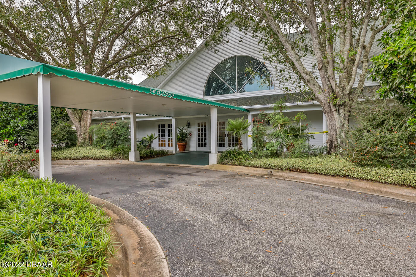 1464 Kinnard Circle Ormond Beach, FL 32174 - Photo 11 of 18 a view of a house with a garden