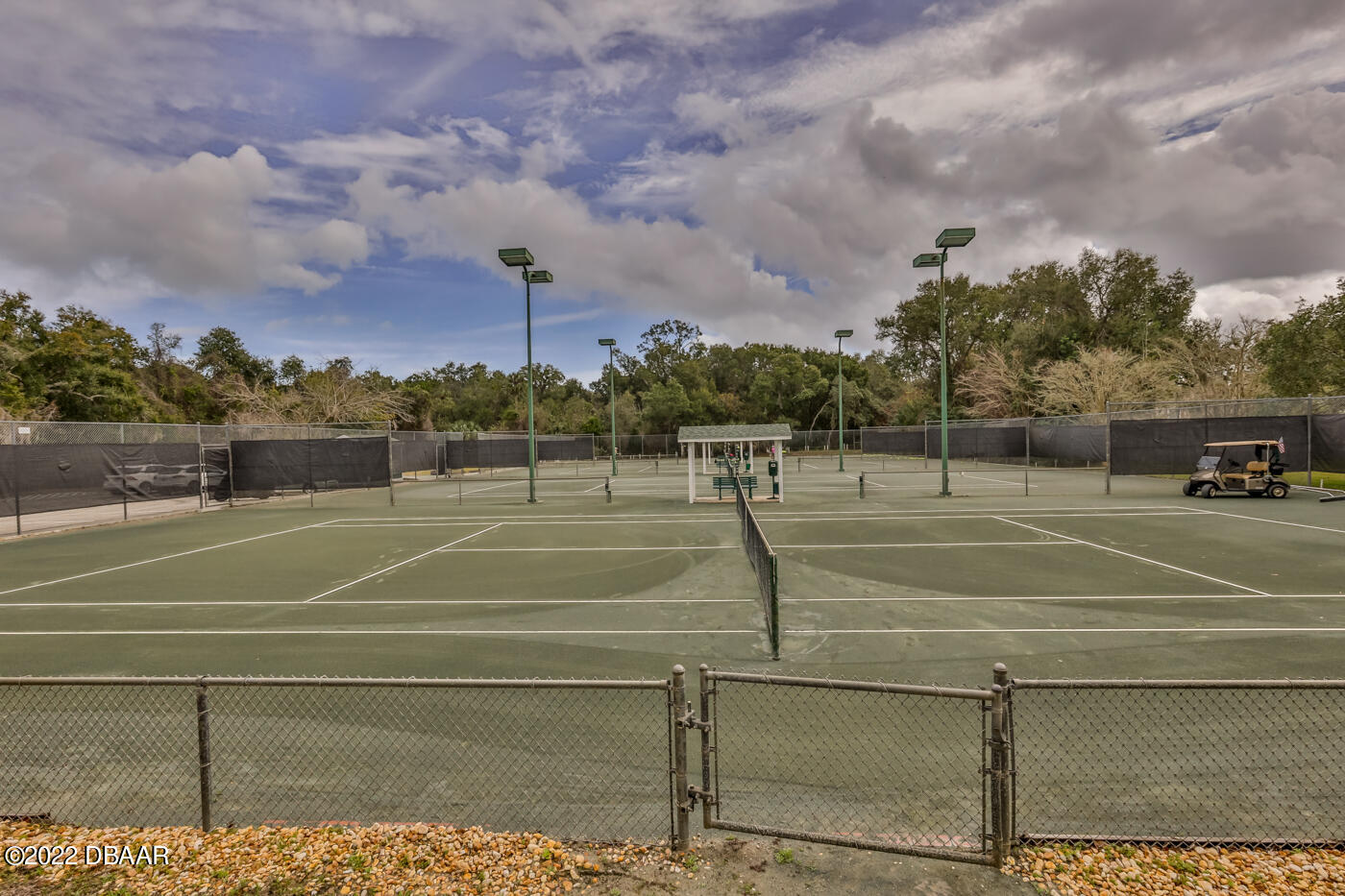 1464 Kinnard Circle Ormond Beach, FL 32174 - Photo 17 of 18 a view of a tennis court