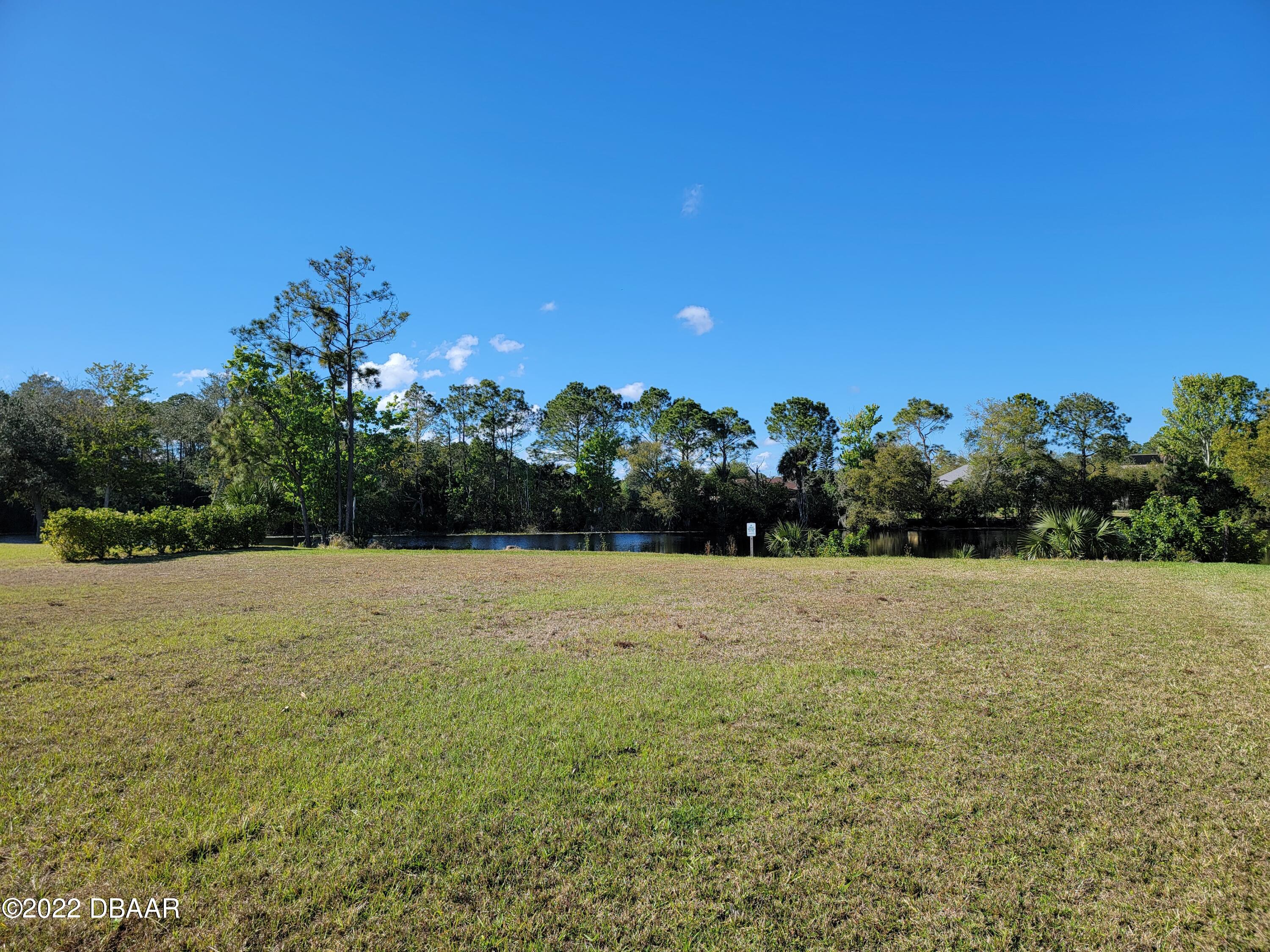 1464 Kinnard Circle Ormond Beach, FL 32174 - Photo 6 of 18 a view of an outdoor space and a yard