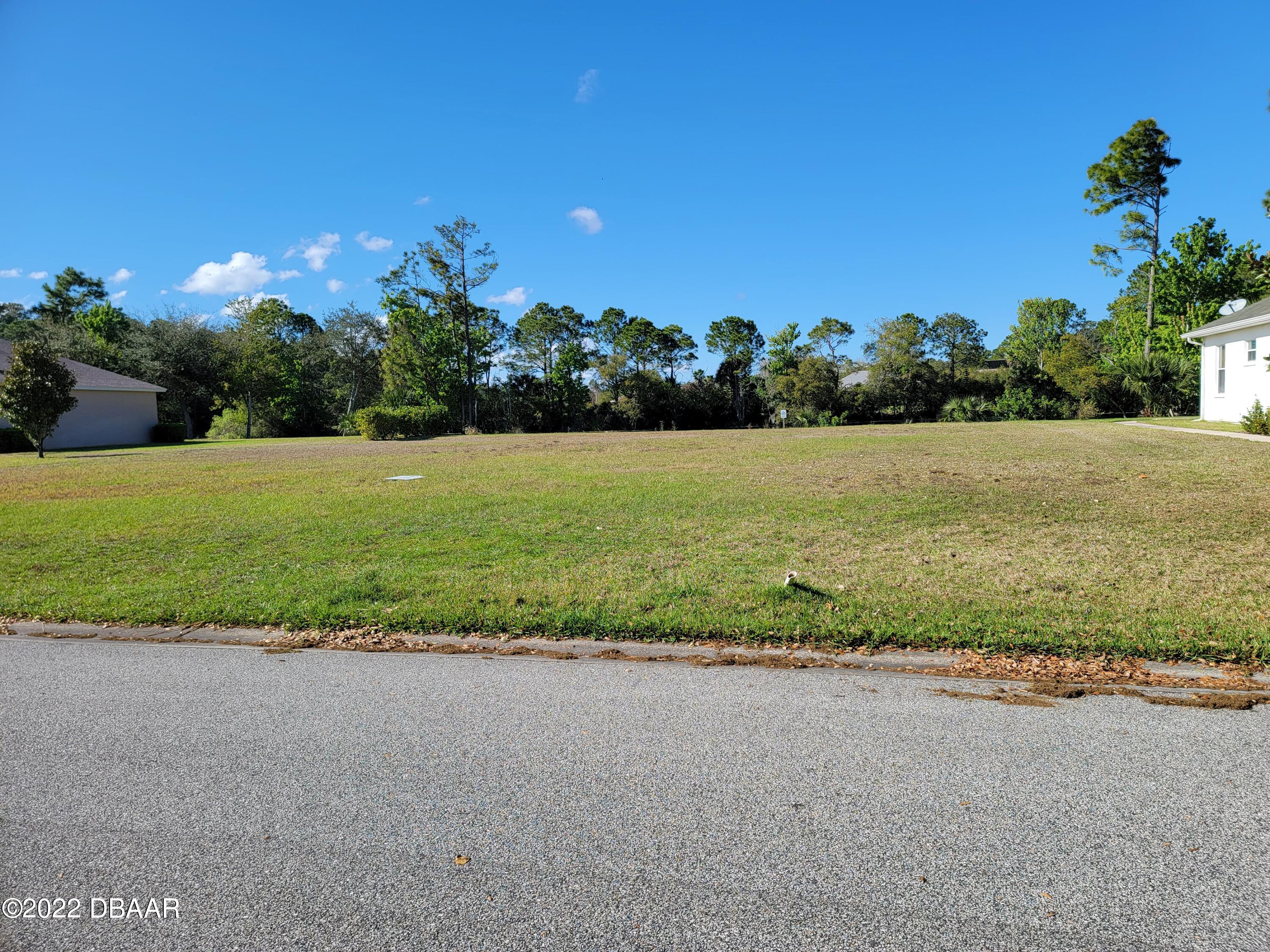 1464 Kinnard Circle Ormond Beach, FL 32174 - Photo 7 of 18 a view of a field with an ocean