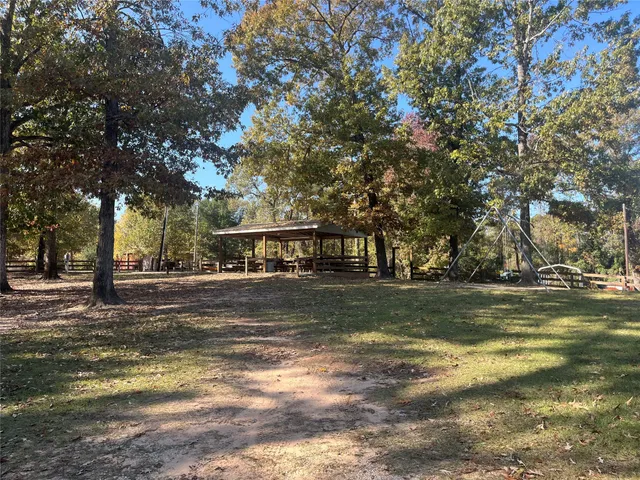a view of a house with a big yard