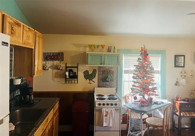 a room with furniture and a flat screen tv