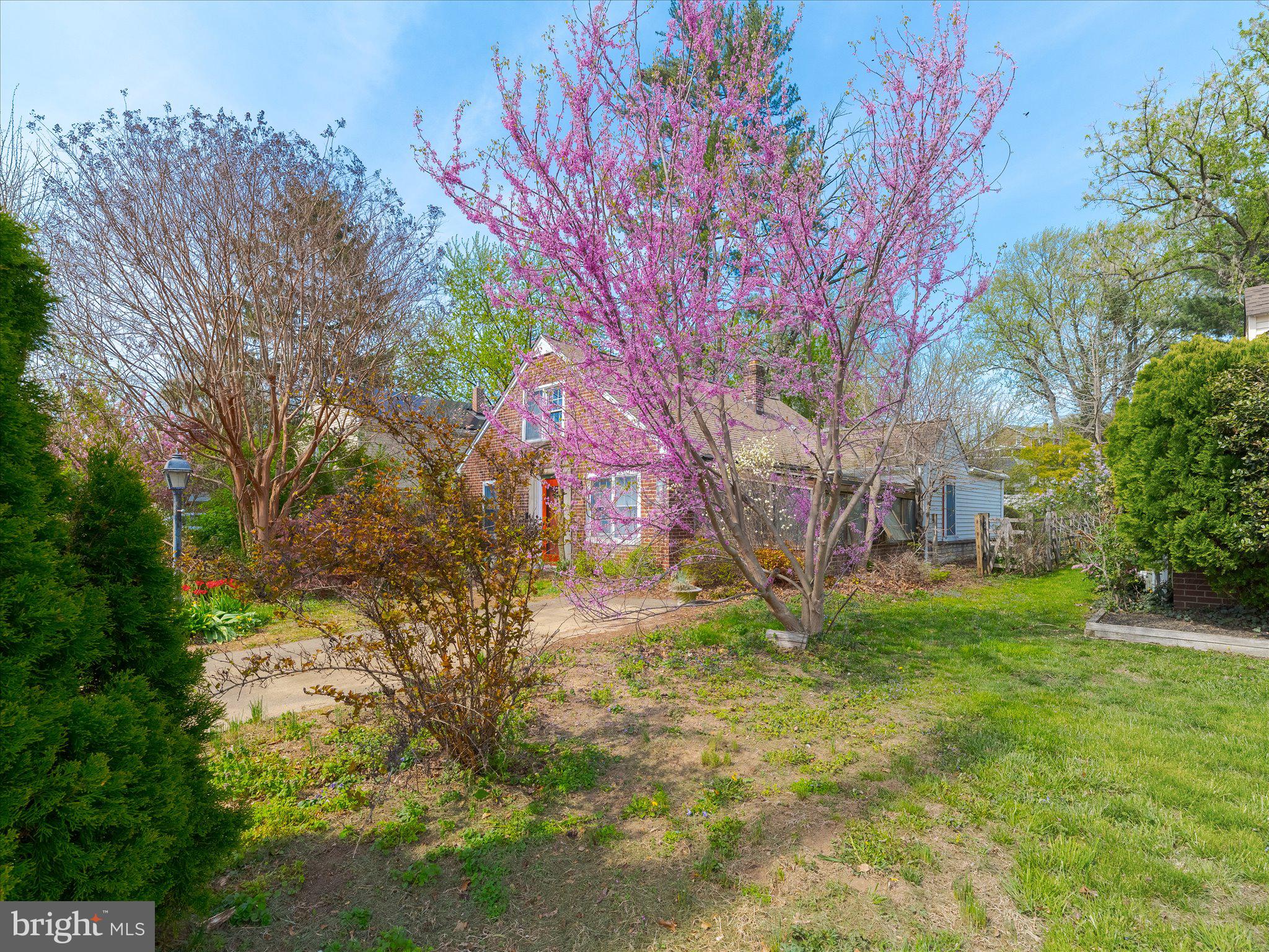 2023 Wharton Road Glenside, PA 19038 - Photo 4 of 26 Charming home with vibrant blooms.