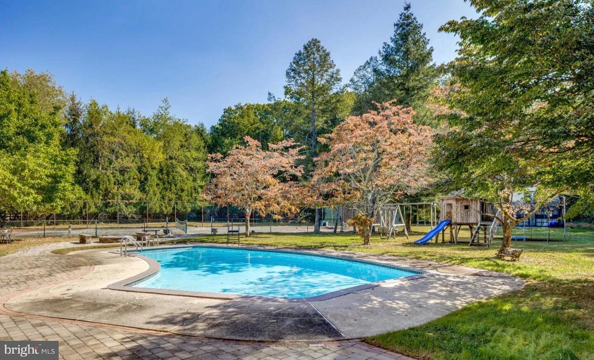 740 Garwood Road Moorestown, NJ 08057 - Photo 30 of 41 Serene backyard oasis with inviting pool.