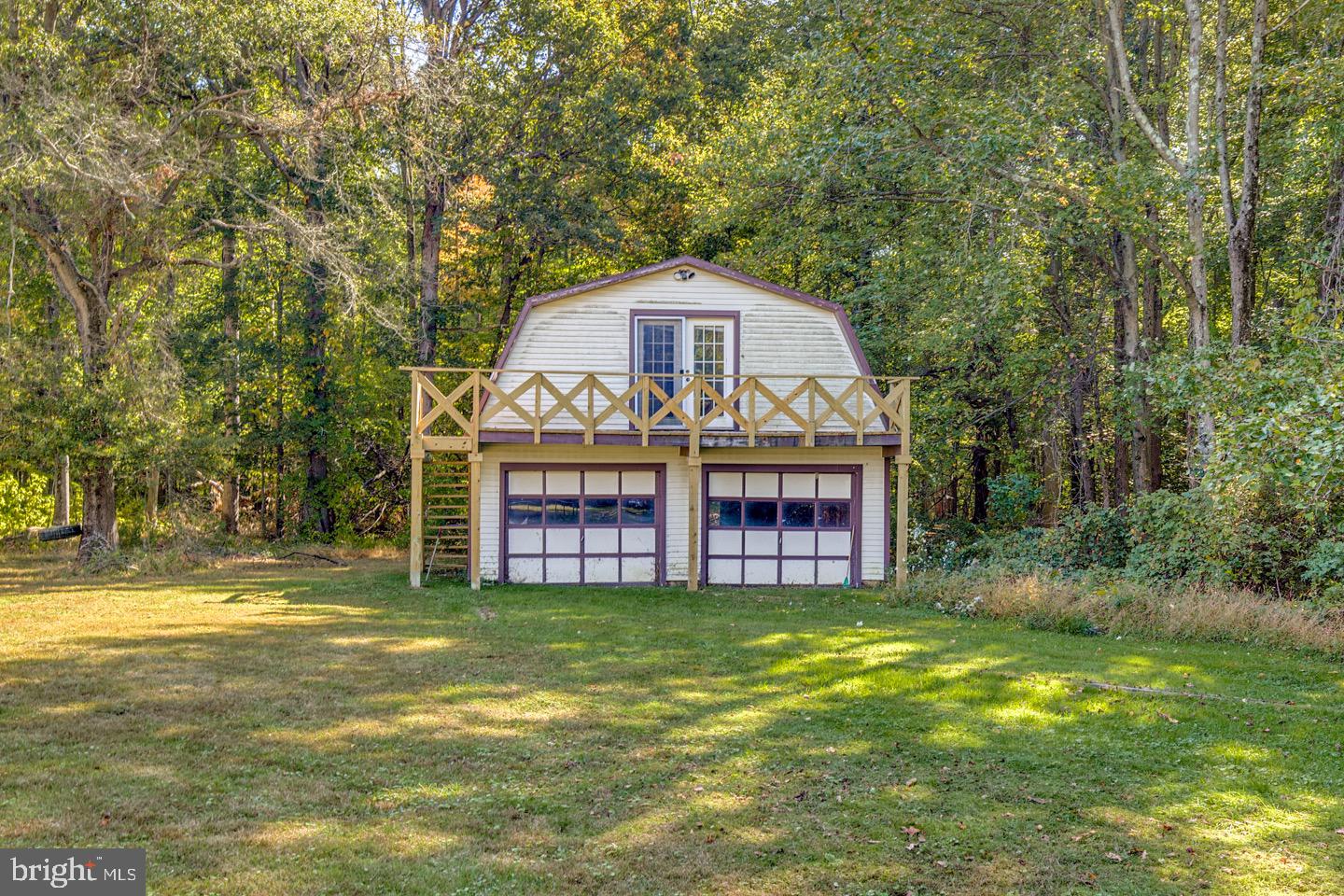 740 Garwood Road Moorestown, NJ 08057 - Photo 35 of 41 Charming garage with scenic woodland backdrop.