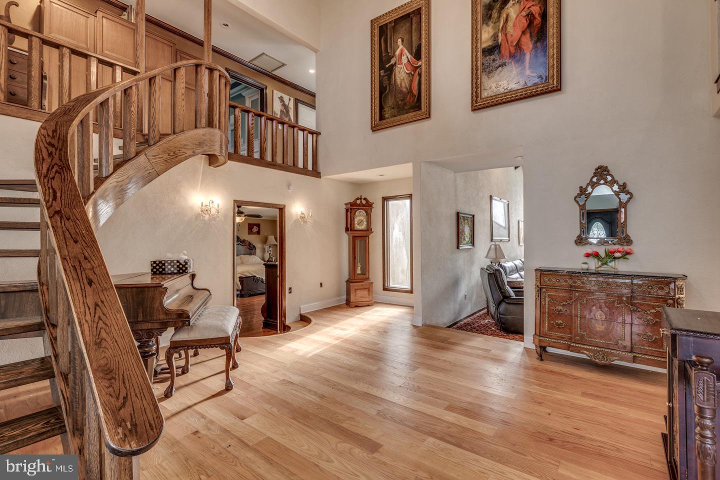 740 Garwood Road Moorestown, NJ 08057 - Photo 5 of 41 Elegant foyer with spiral staircase charm.