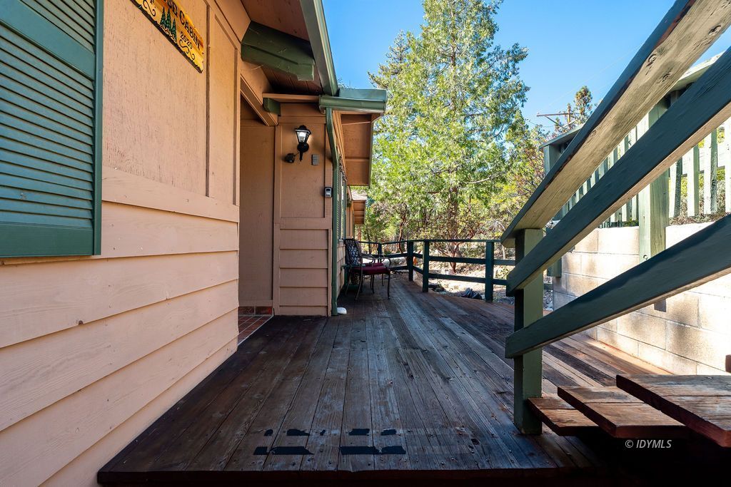 25580 Fir Street Idyllwild, CA 92549 - Photo 5 of 48 a view of outdoor space with wooden floor and stairs