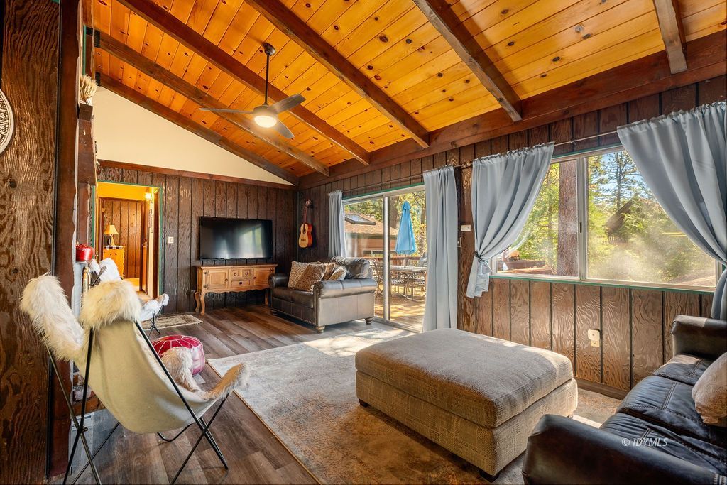 25580 Fir Street Idyllwild, CA 92549 - Photo 10 of 48 a living room with furniture and a flat screen tv