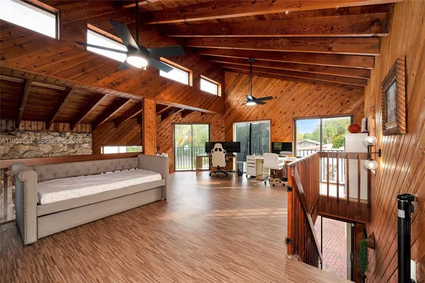 a view of livingroom with furniture and wooden floor