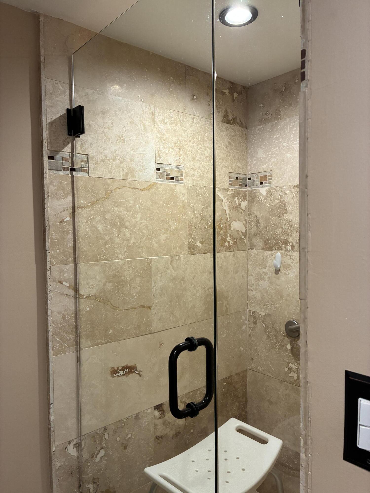 355 Normandy Lane Delray Beach, FL 33484 - Photo 13 of 33 a bathroom with a shower