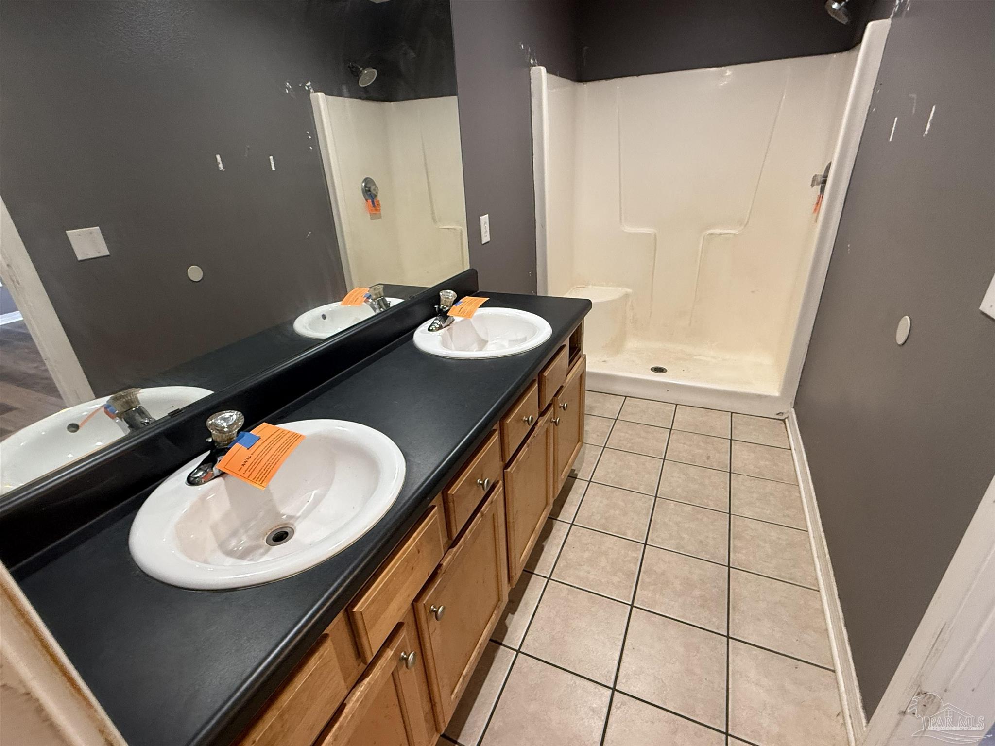1009 Rachel Circle Cantonment, FL 32533 - Photo 6 of 11 a bathroom with a sink mirror and vanity