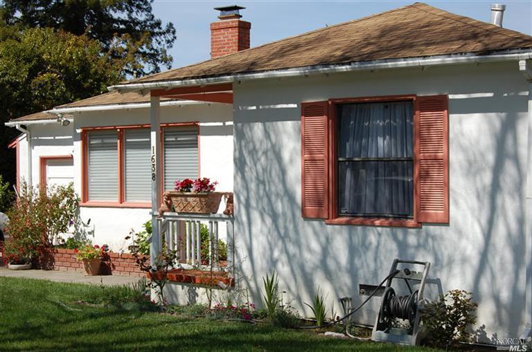 1638 Hill Road Novato, CA 94947 - Photo 1 of 1 a front view of a house with garden