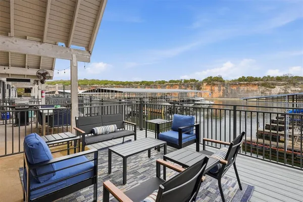 a view of a terrace with seating area