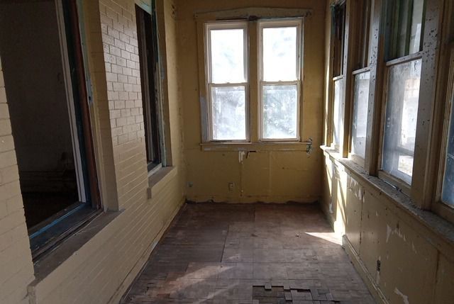 6531 South May Street Chicago, IL 60621 - Photo 2 of 12 a view of an empty room with a window