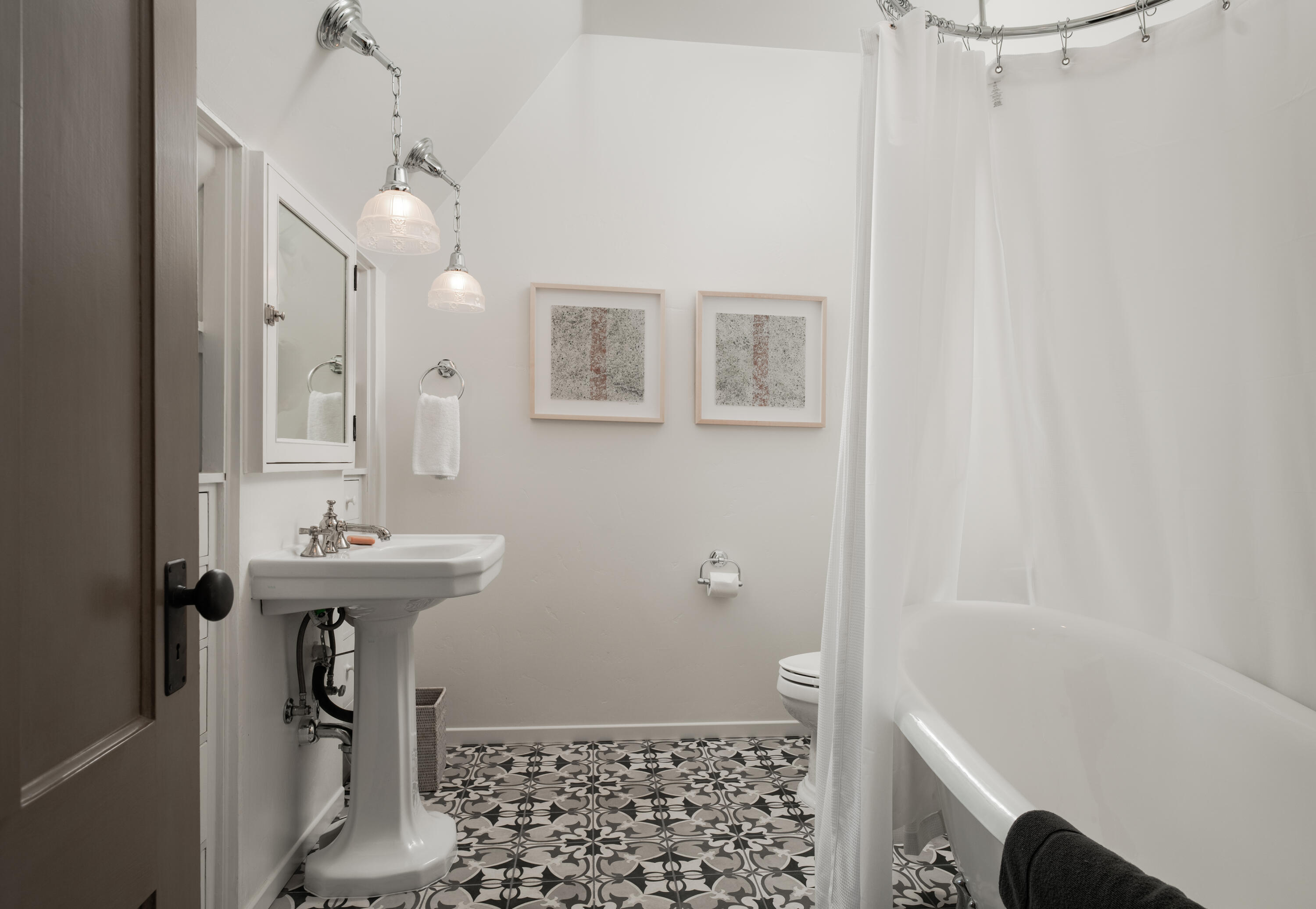 175 Miramar Avenue Montecito, CA 93108 - Photo 23 of 33 a bathroom with a sink a mirror and a shower