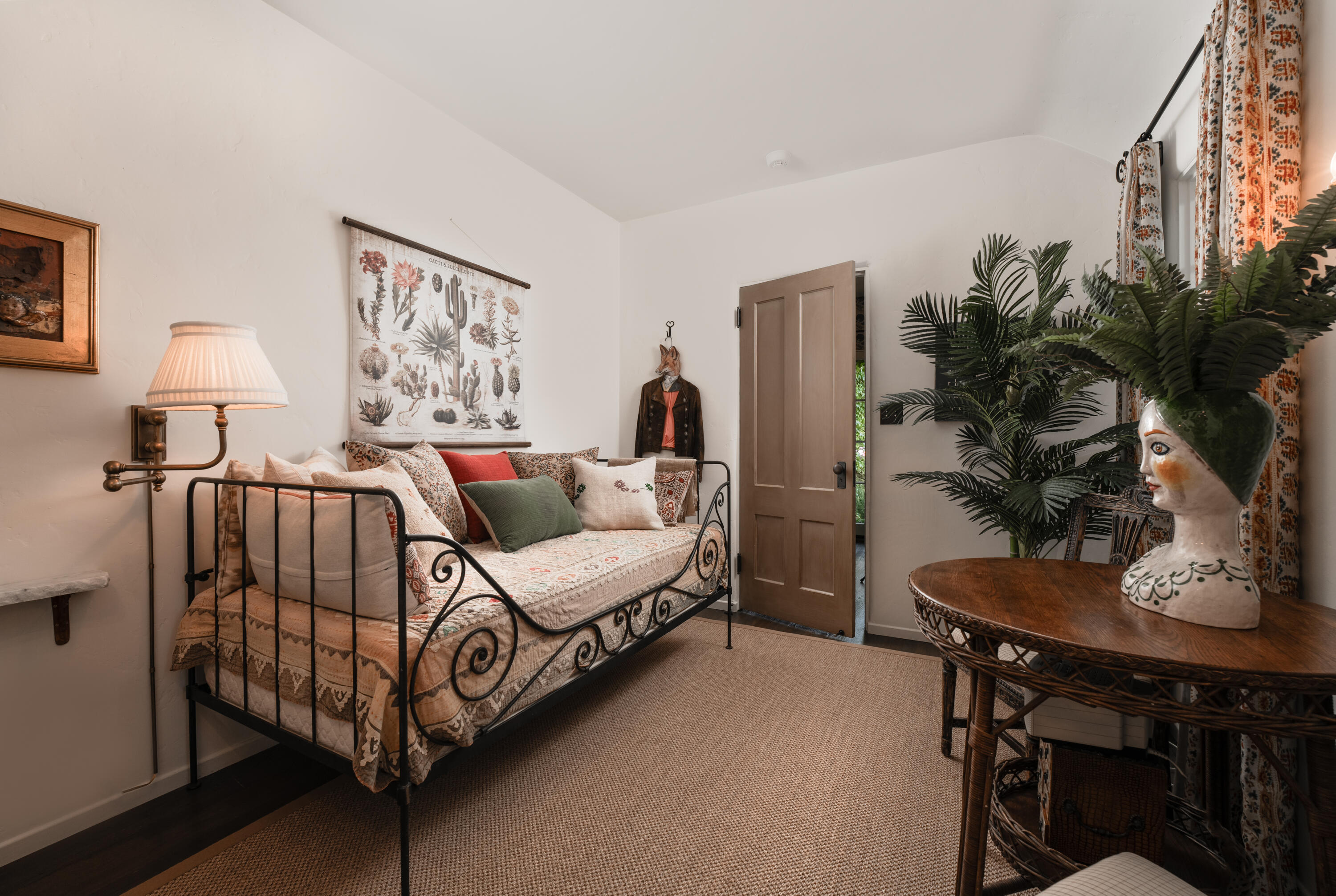 175 Miramar Avenue Montecito, CA 93108 - Photo 24 of 33 a living room with furniture and a potted plant