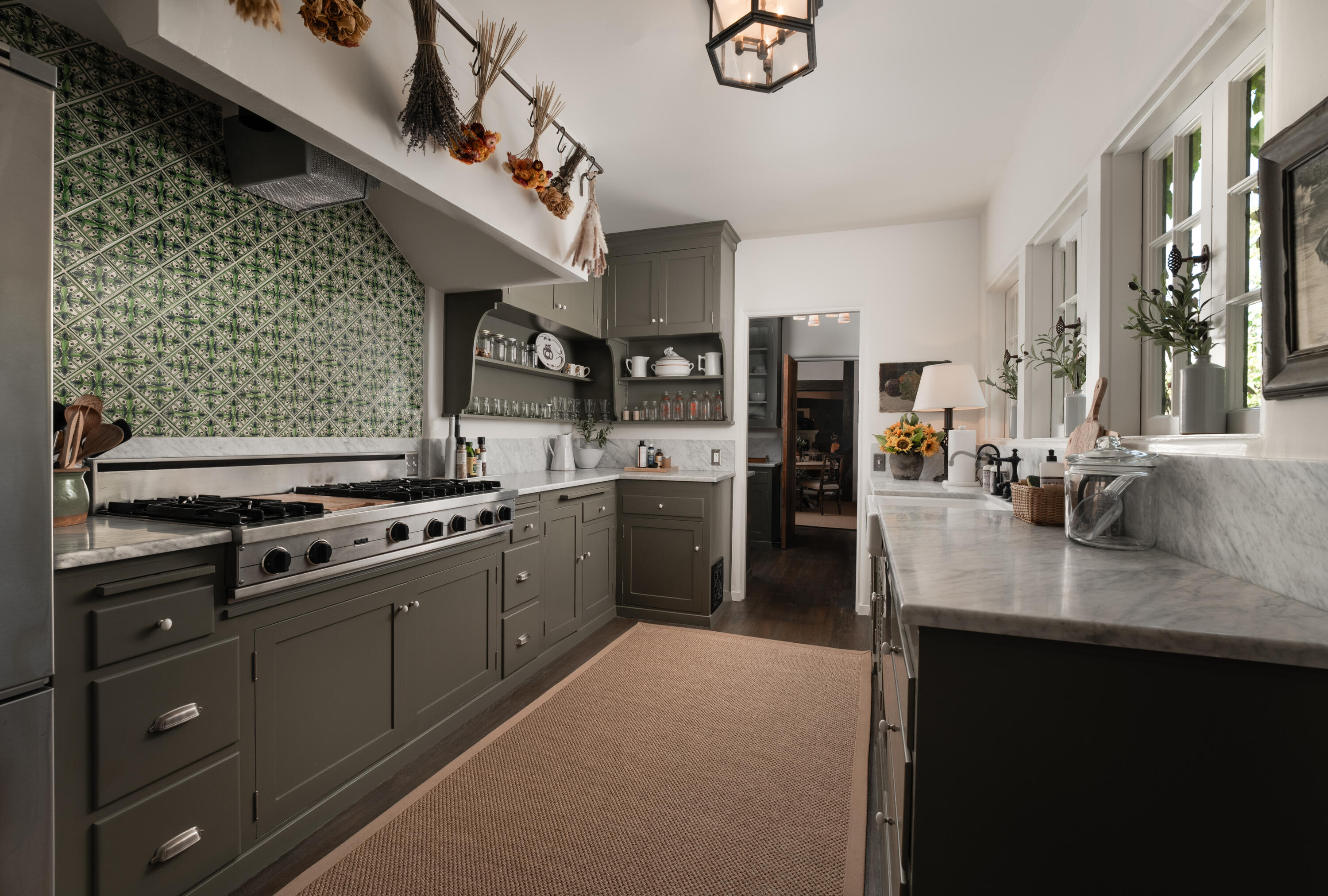 175 Miramar Avenue Montecito, CA 93108 - Photo 10 of 33 a kitchen with stainless steel appliances granite countertop a sink stove and refrigerator