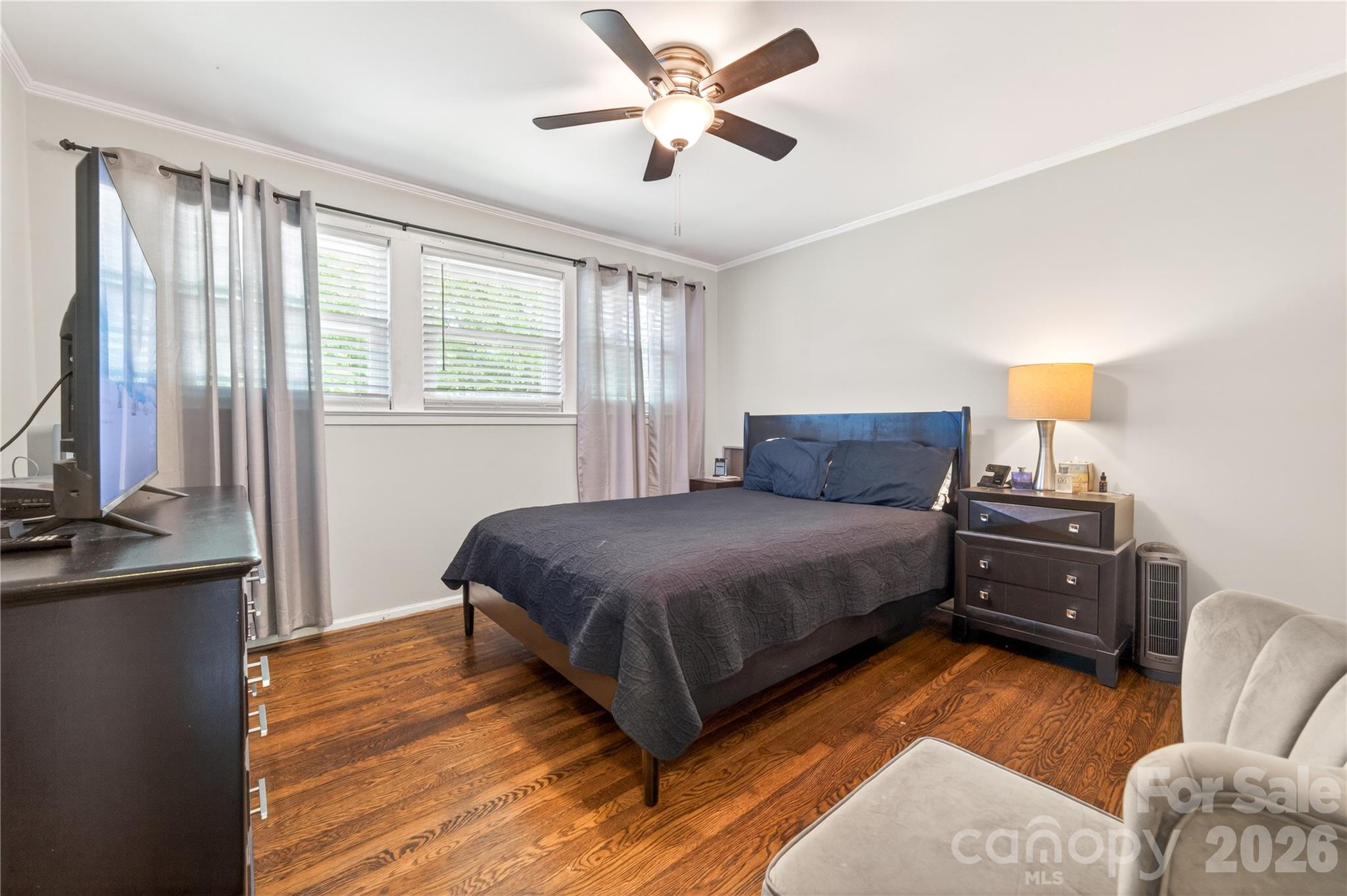 3241 Minnesota Road Charlotte, NC 28208 - Photo 17 of 18 a bedroom with a bed and window