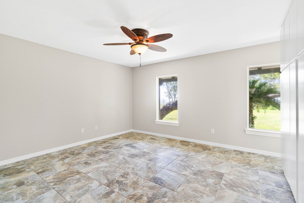 1931 North Fulton Beach Road Rockport, TX 78382 - Photo 14 of 40 a view of an empty room with a window