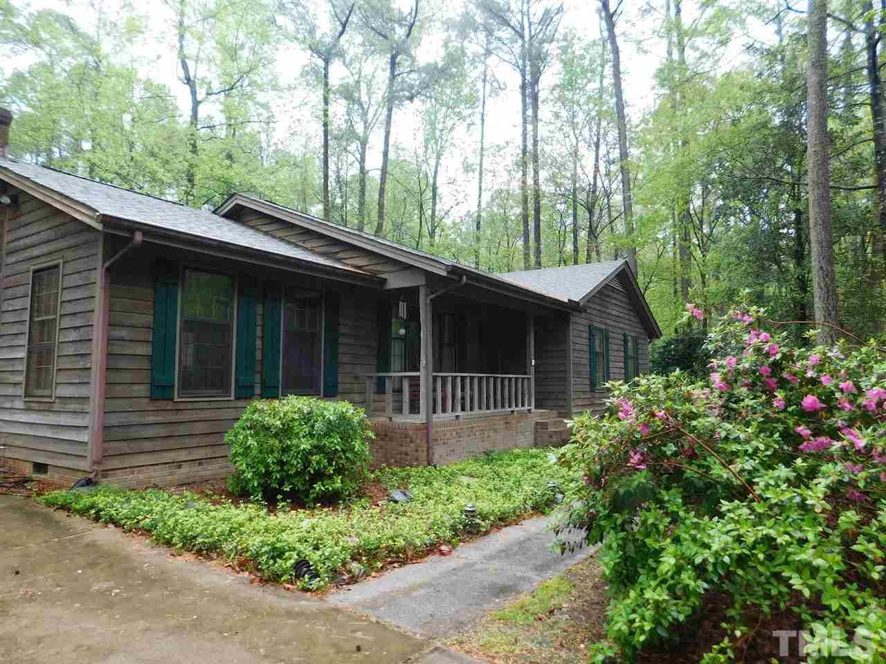 3224 Brennan Drive Raleigh, NC 27613 - Photo 1 of 22 a front view of a house with garden