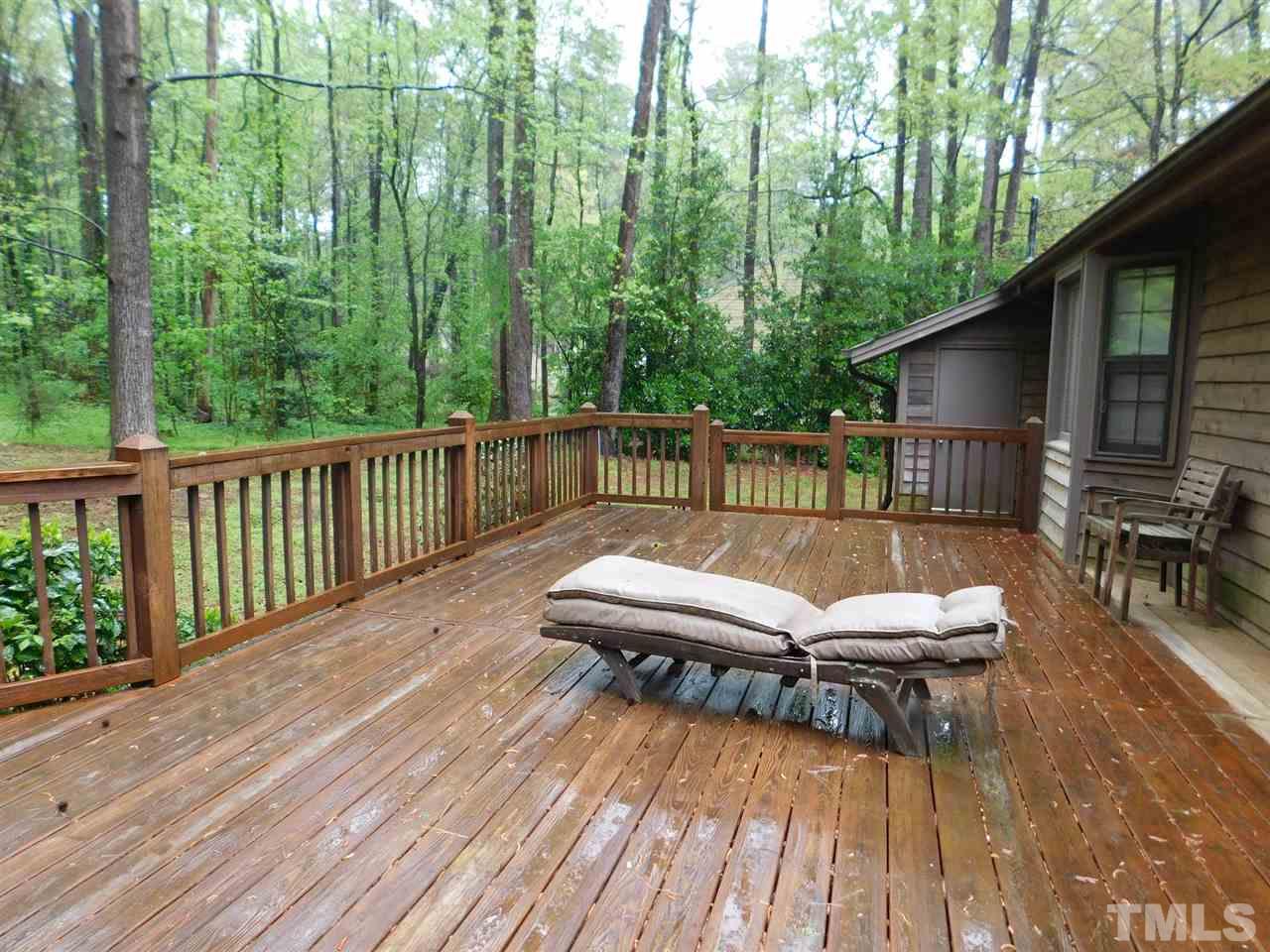 3224 Brennan Drive Raleigh, NC 27613 - Photo 19 of 22 a view of a wooden deck with furniture
