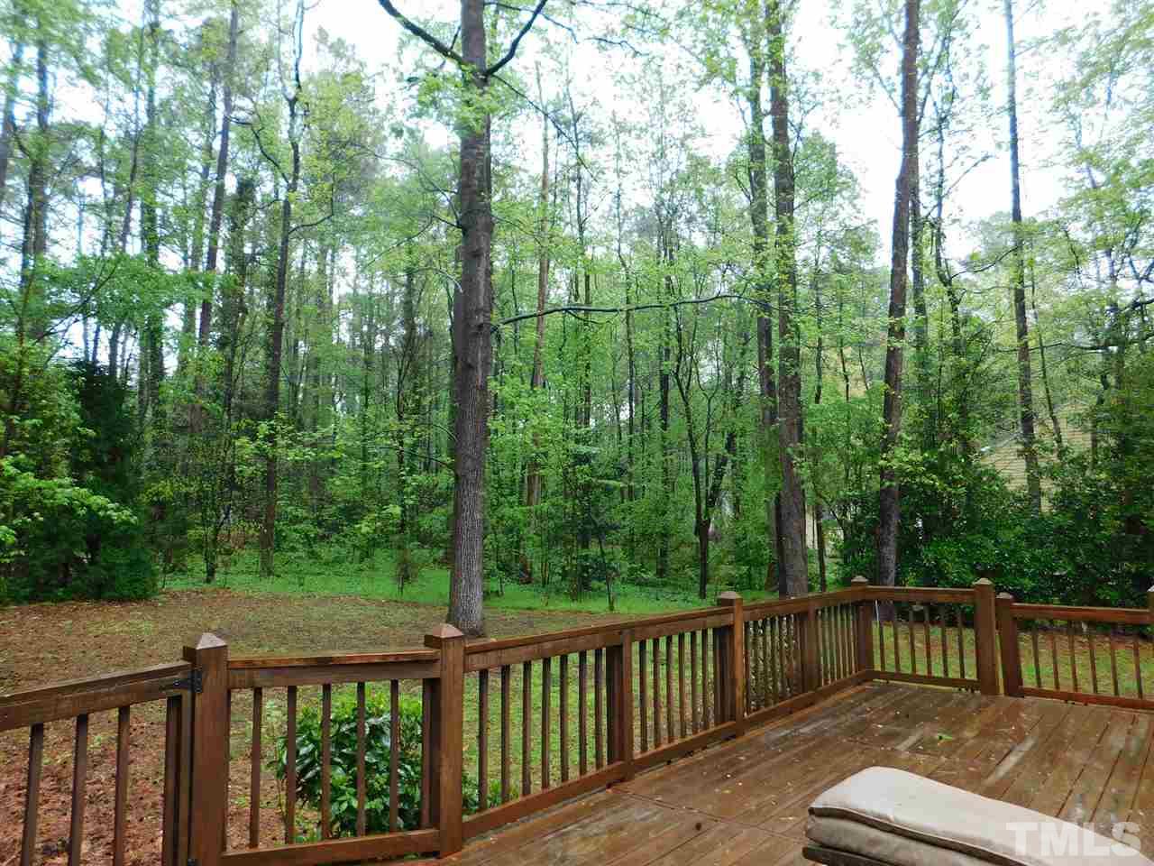 3224 Brennan Drive Raleigh, NC 27613 - Photo 20 of 22 a view of a two couches with wooden fence