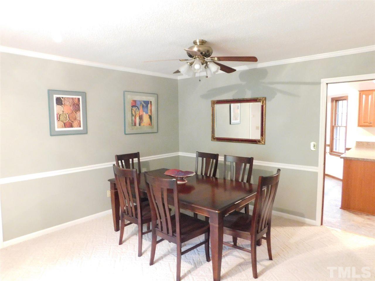 3224 Brennan Drive Raleigh, NC 27613 - Photo 4 of 22 a view of a dining room with furniture