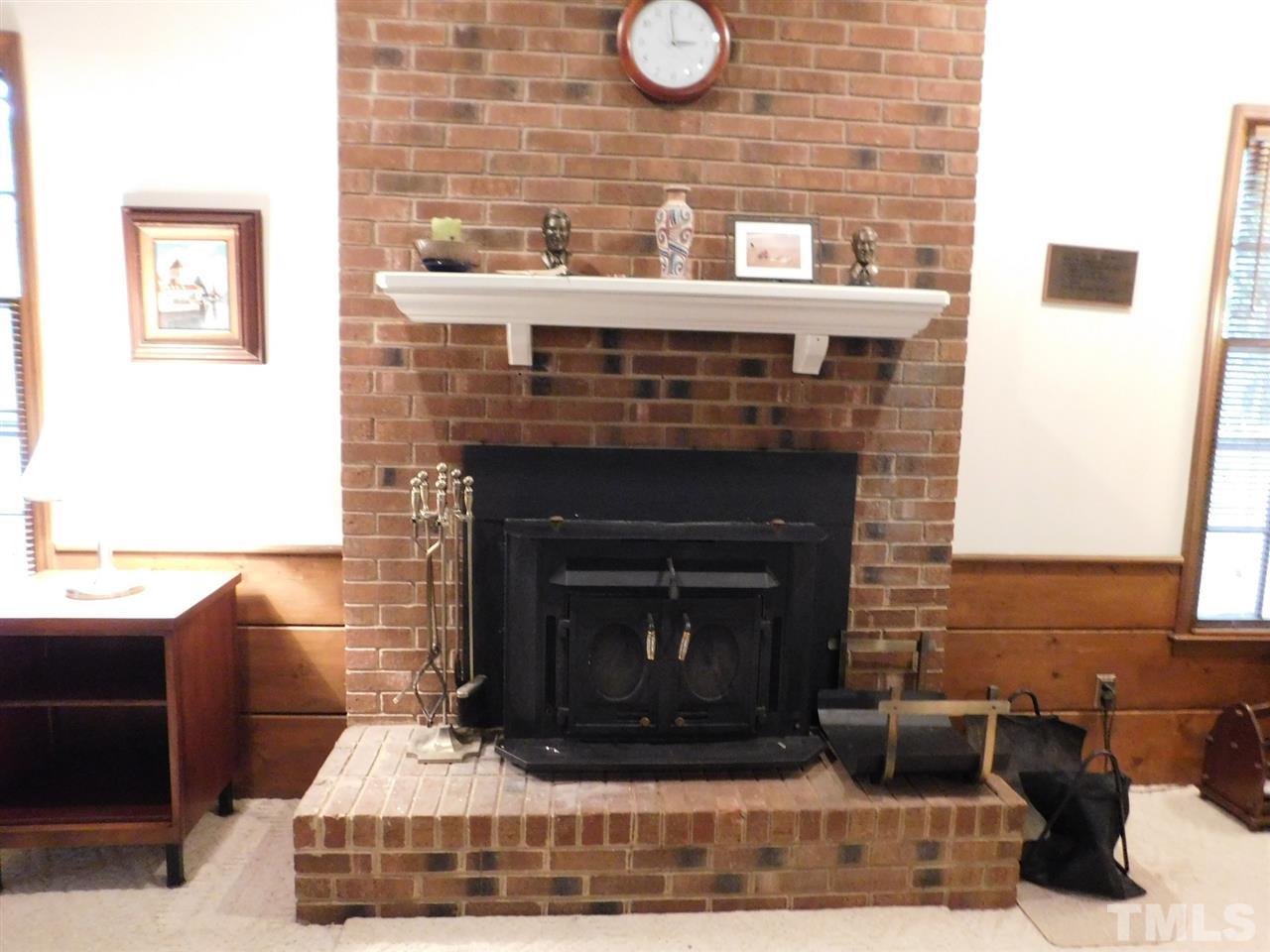 3224 Brennan Drive Raleigh, NC 27613 - Photo 9 of 22 a room with fireplace